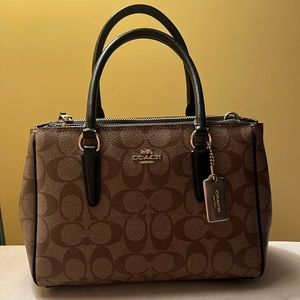 brown logo Coach purse